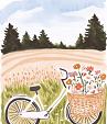 Fiets met bloemen in fietsmand