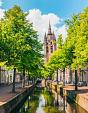 Gracht met scheve kerktoren, Oude Kerk, Delft
