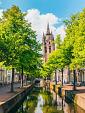 Gracht met scheve kerktoren, Oude Kerk, Delft