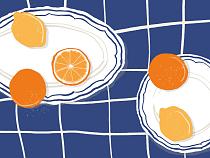 Citrusvruchten op bord