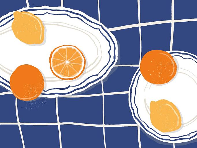 Citrusvruchten op bord