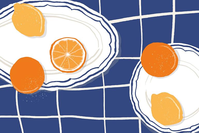 Citrusvruchten op bord