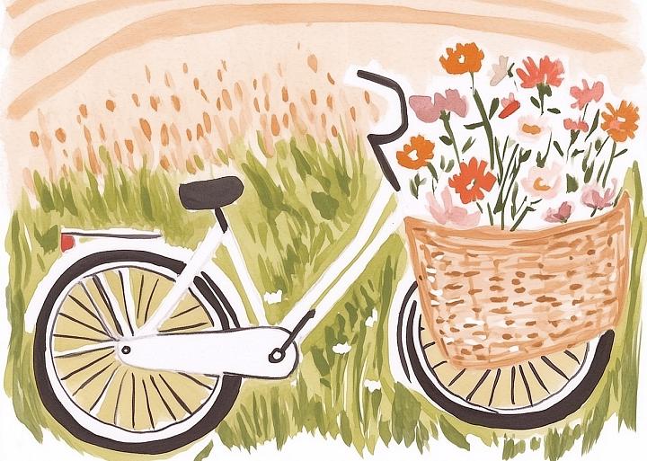 Fiets met bloemen in fietsmand