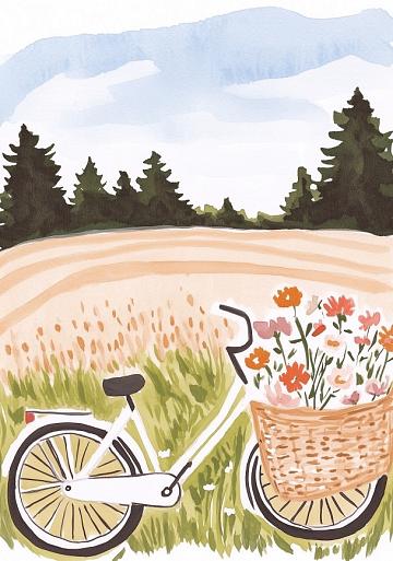 Fiets met bloemen in fietsmand